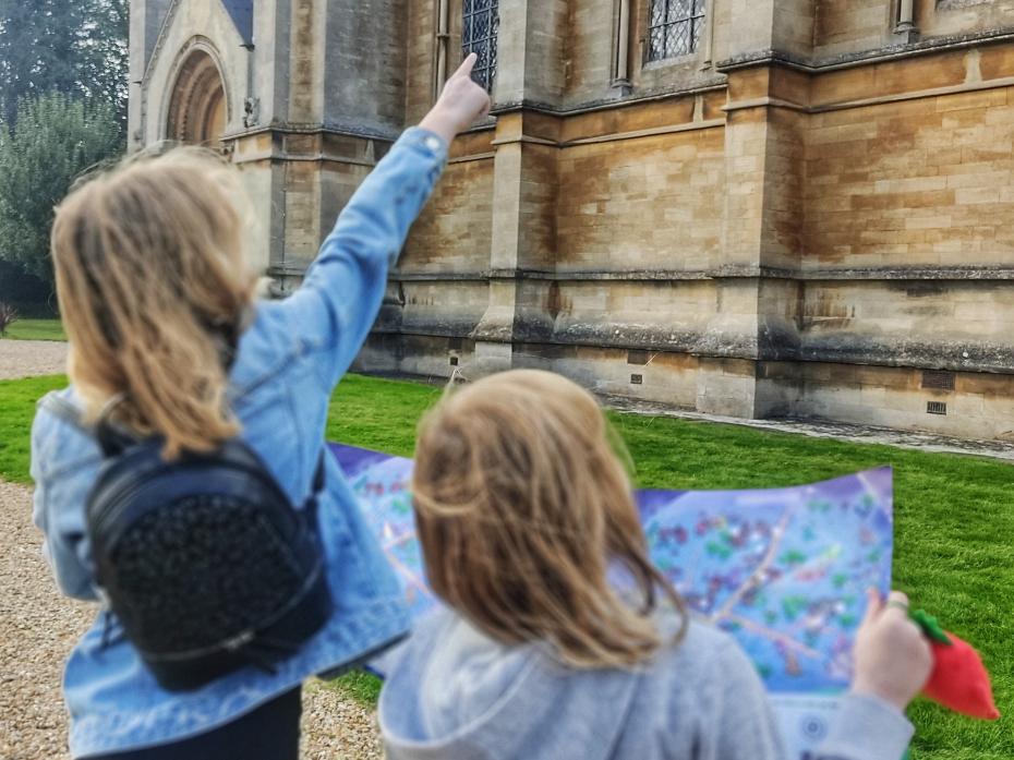 Girls checking out the gargoyles and grotesques at a local church